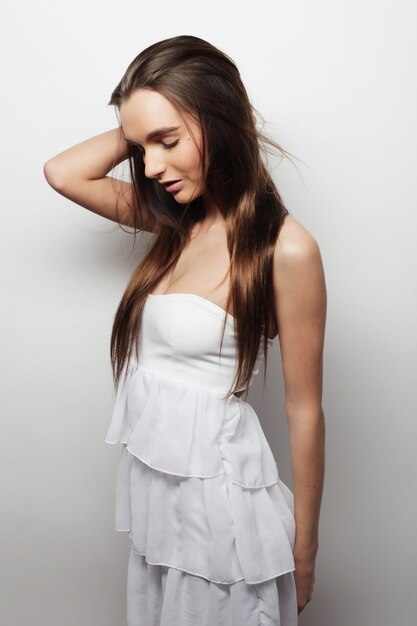 Beautiful young happy woman. Studio shot.