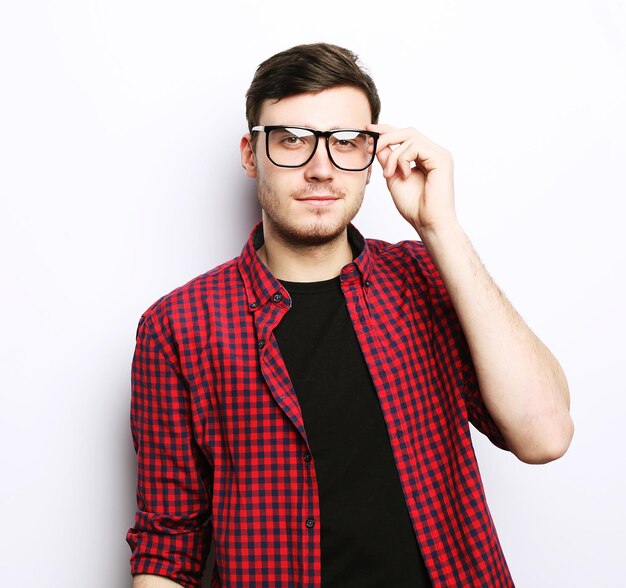 Beautiful young man wearing glasses