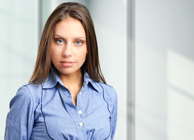 Beautiful young manager in her office