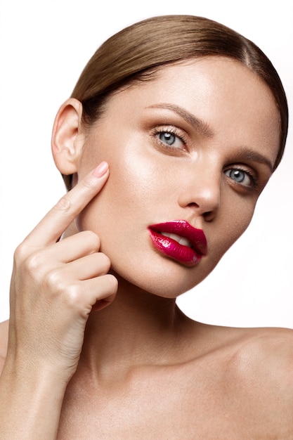 Beautiful young model with red lips isoleted on wight