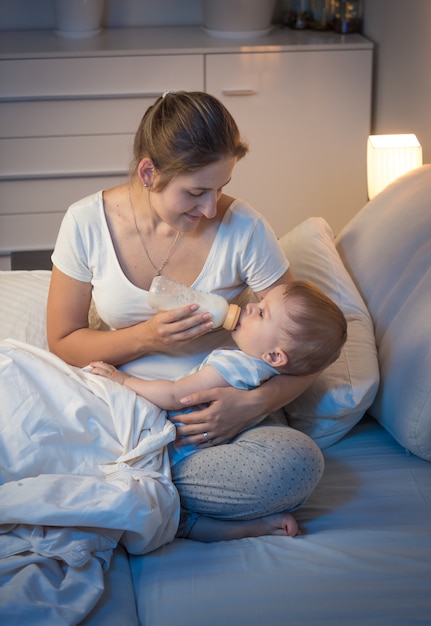 Beautiful young mother is taking care of her toddler