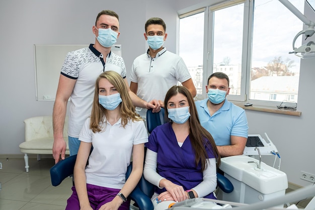 Beautiful young people experienced in medicine who love to treat teeth posing for a portrait Concept of happy dentists on portrait