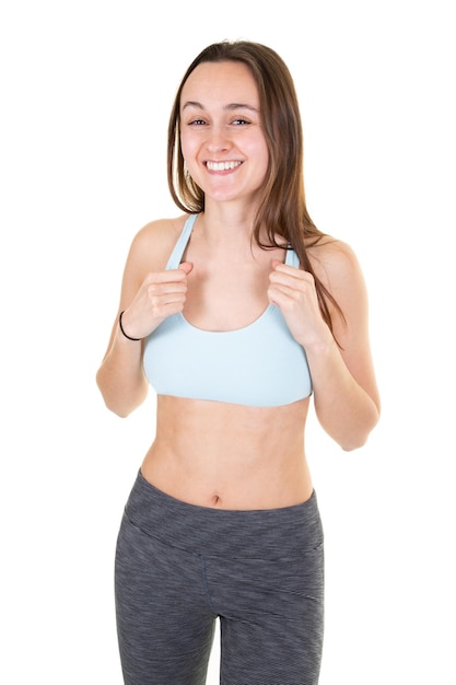 Beautiful young smiling sporty girl in studio