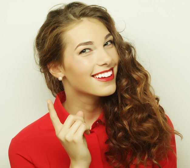 Beautiful young surprised woman Studio shot