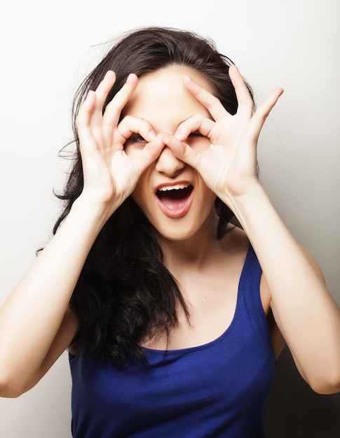 Beautiful young surprised woman Studio shot