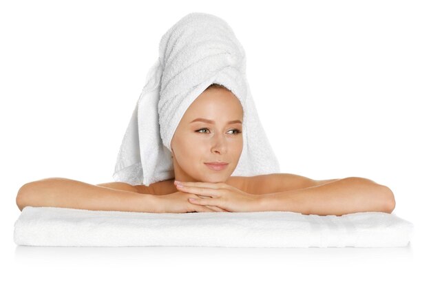 Beautiful young woman after bath on white background