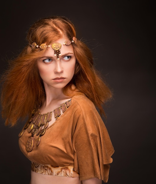 Beautiful young woman dressed as Amazons