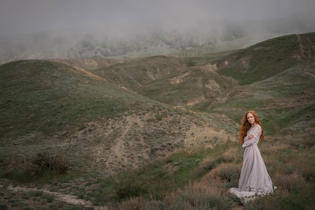 Beautiful young woman in an elegant dress