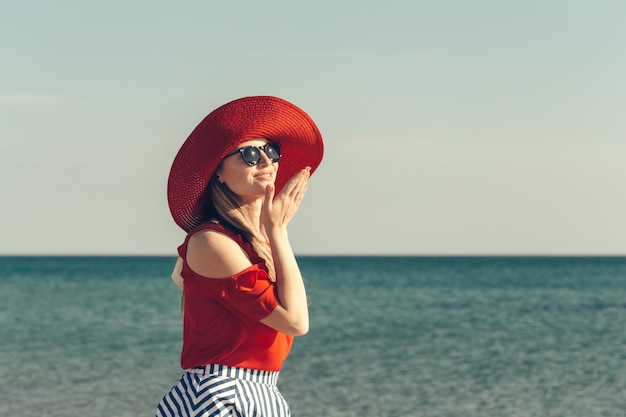 Beautiful young woman enjoy summer vacation on the beach