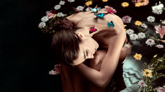 Beautiful young woman enjoying spring bath