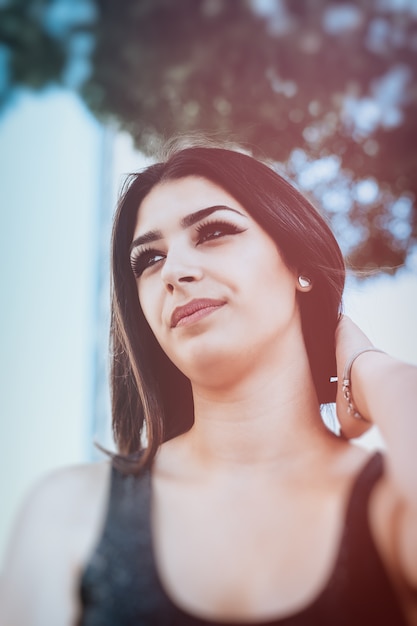 Beautiful young woman feeling happy and full of life.