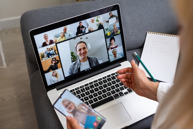 Beautiful young woman having video conference call via computer. Call Meeting. Home office. Stay at home and work from home concept during Coronavirus pandemic