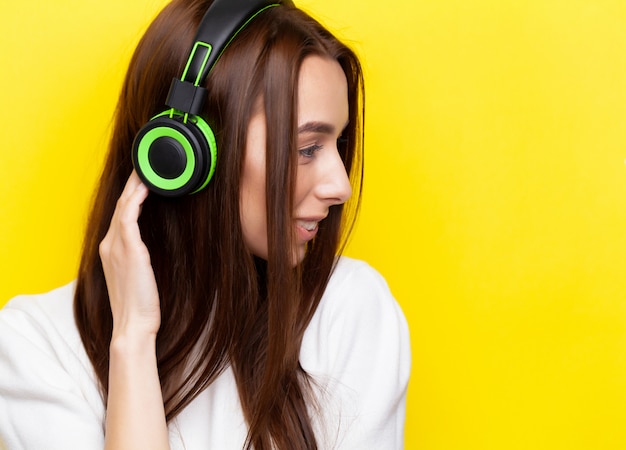 A beautiful young woman in headphones