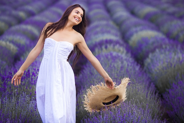 Beautiful young woman in lavander field