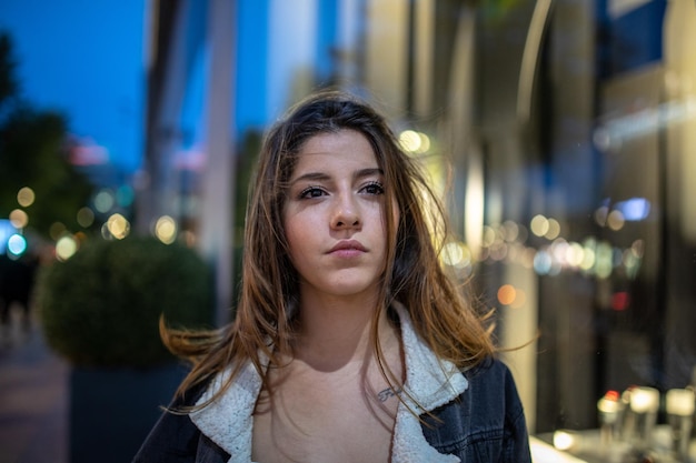 Beautiful young woman looking away