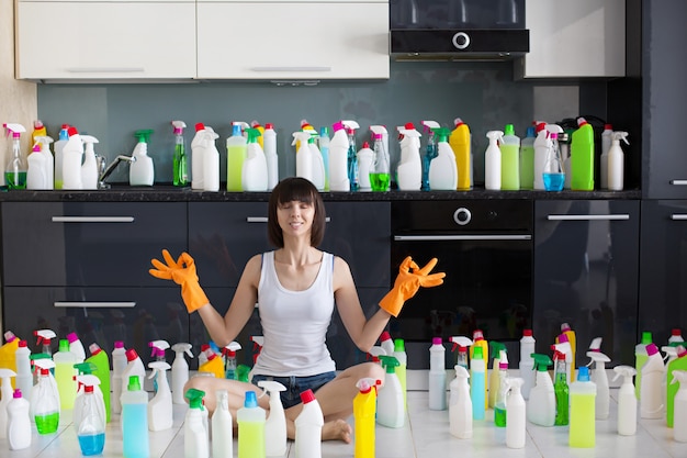 Beautiful young woman makes cleaning the house.