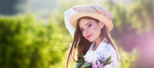 Beautiful young woman near blooming spring tree youth love fashion romantic and lifestyle concept be