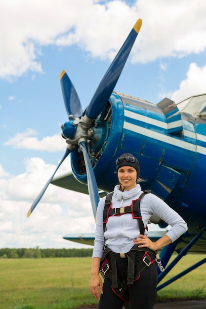 beautiful young woman in parachuting gear