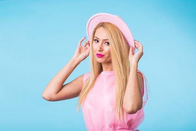 Beautiful young woman in a pink dress