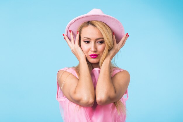 Beautiful young woman in a pink dress