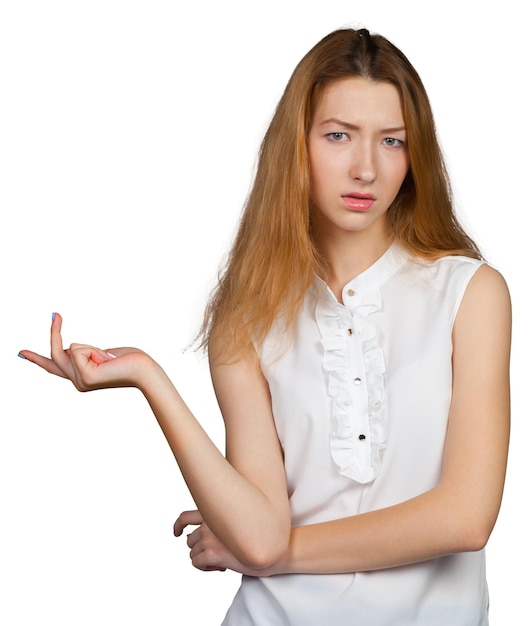 Beautiful young woman pointing and making a presentation