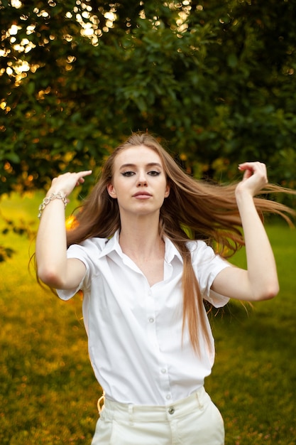 Beautiful young woman portrait on sunset