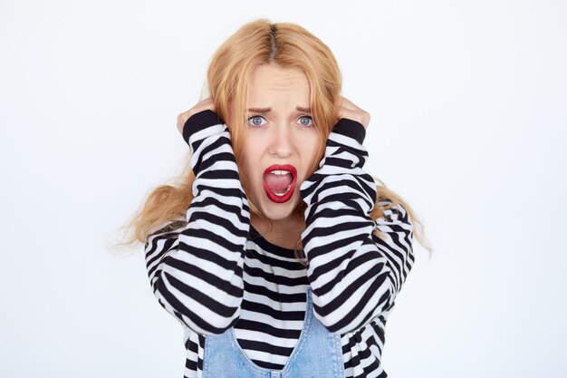 Beautiful young woman prisoner isolated on a white background