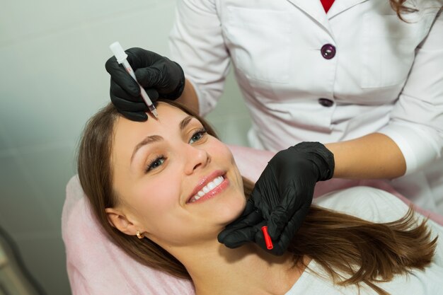 beautiful young woman at a reception at a beautician in a beauty salon