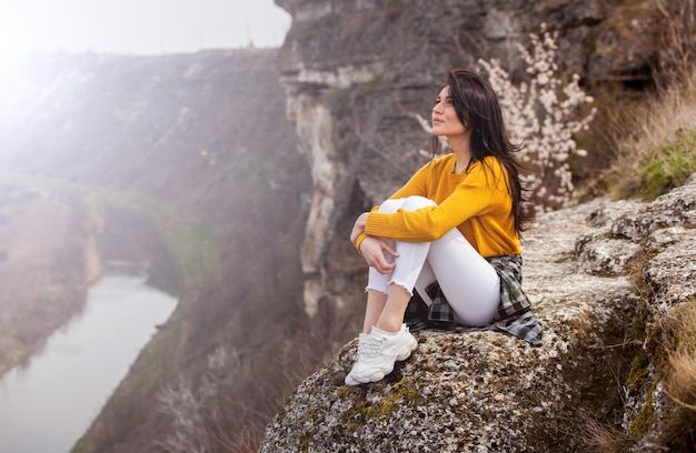 Beautiful Young Woman Relaxing outdoors