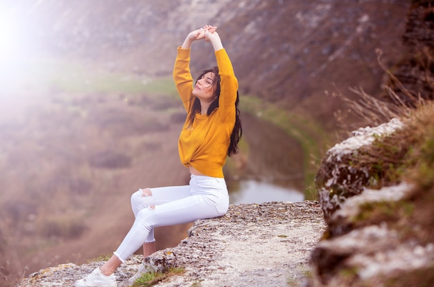 Beautiful Young Woman Relaxing outdoors