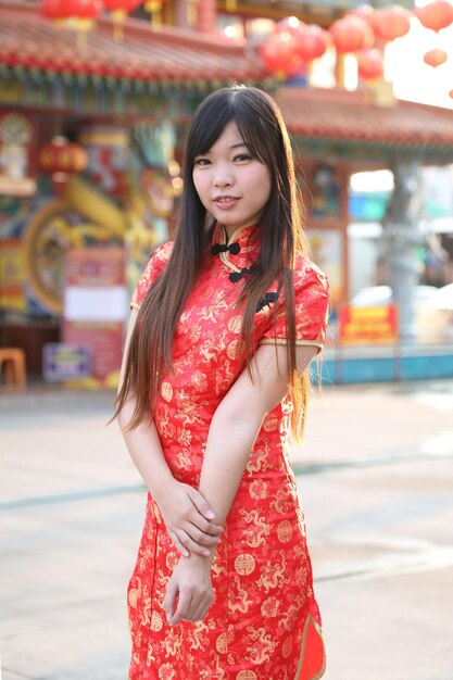 Beautiful young woman standing outdoors