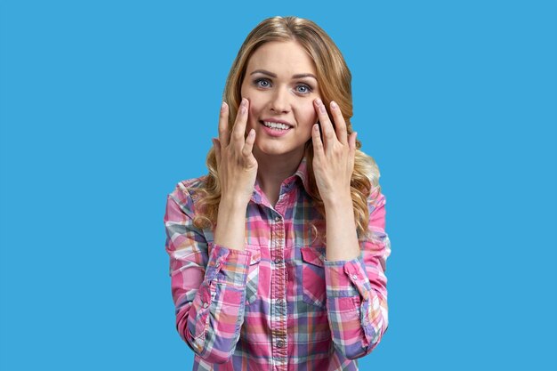 Beautiful young woman in stylish shirt posing on color background charming woman model posing at cam