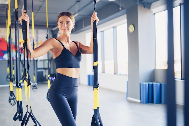 Beautiful young woman training