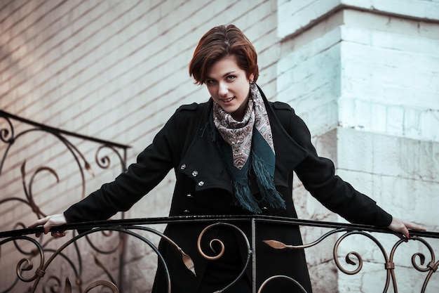 Beautiful young woman walking on the street