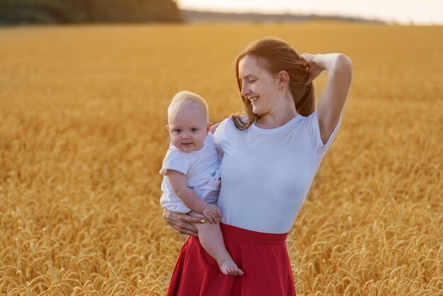 Beautiful young woman with child