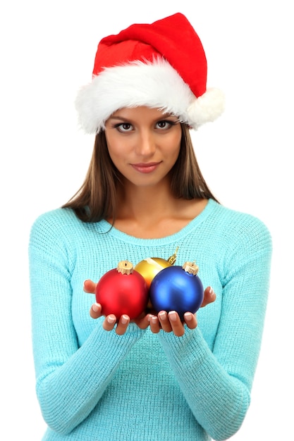 Foto bella giovane donna con le palle di natale, isolata su white