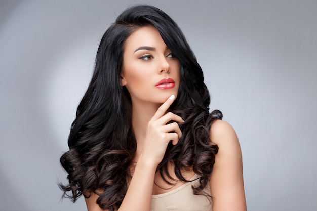 Beautiful Young Woman with Clean healthy curly hair