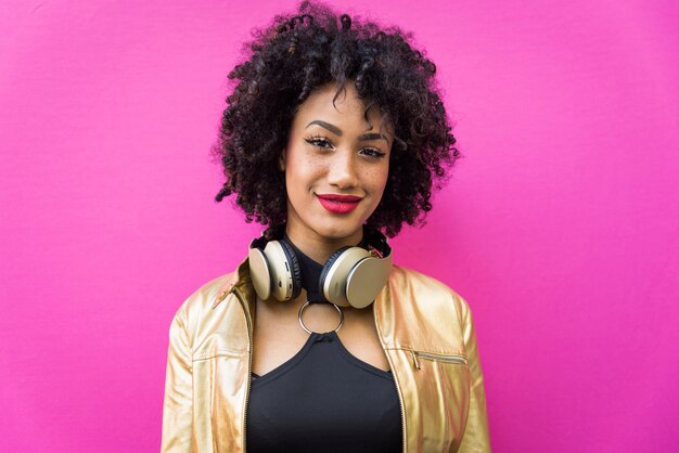 Beautiful young woman with curly black hair