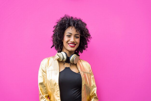 Beautiful young woman with curly black hair