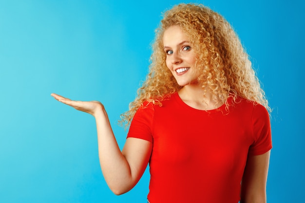 Beautiful young woman with curly hair