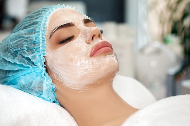 Beautiful young woman with face mask