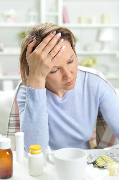 Beautiful young woman with headache