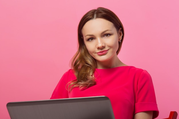 Beautiful young woman with laptop