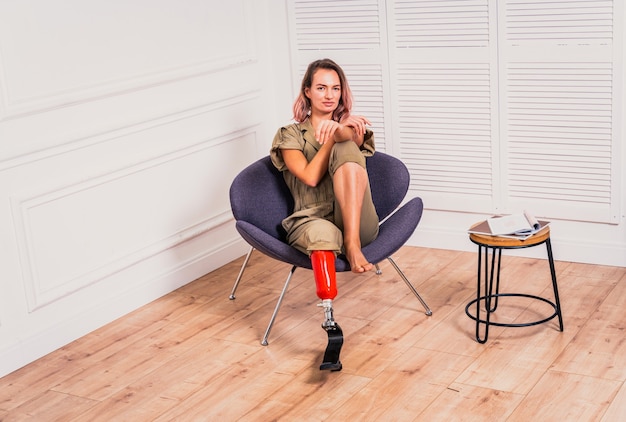 Beautiful young woman with prosthetic leg