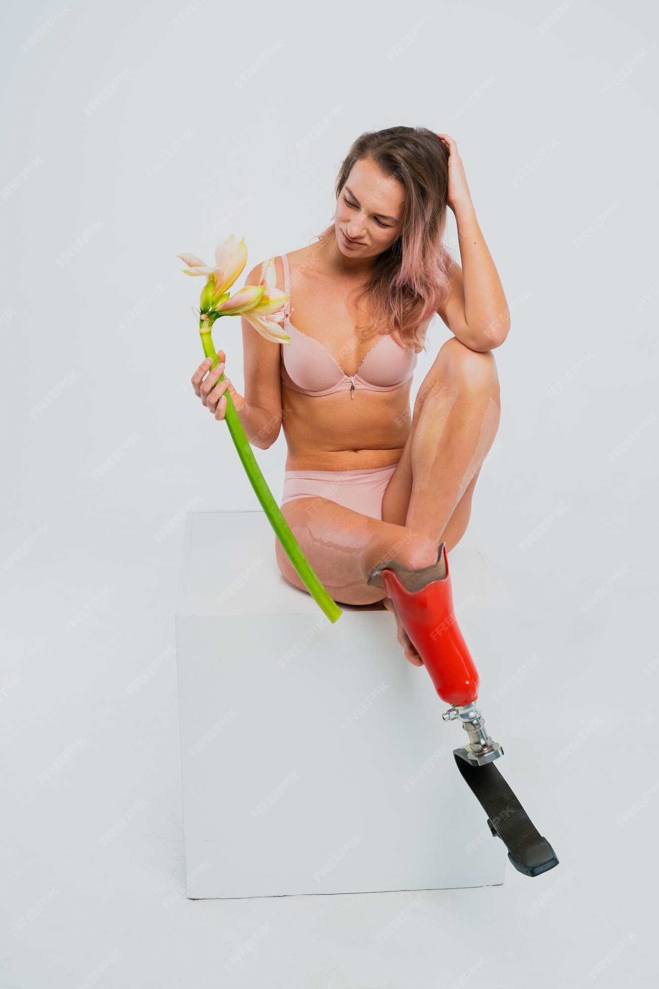 Premium Photo  Beautiful young woman with prosthetic leg