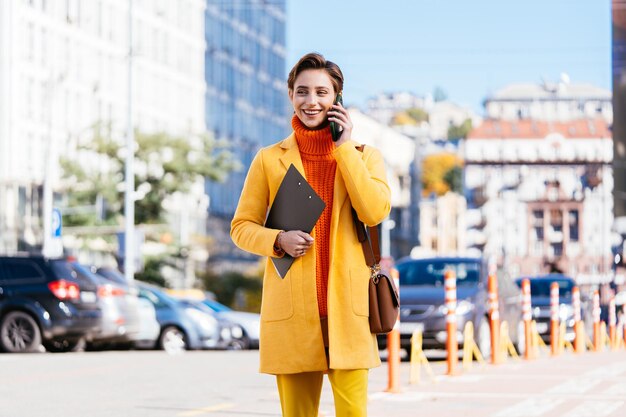 Beautiful young woman with short hair in the city