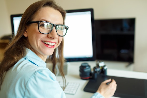 Beautiful young woman working from home modern business concept