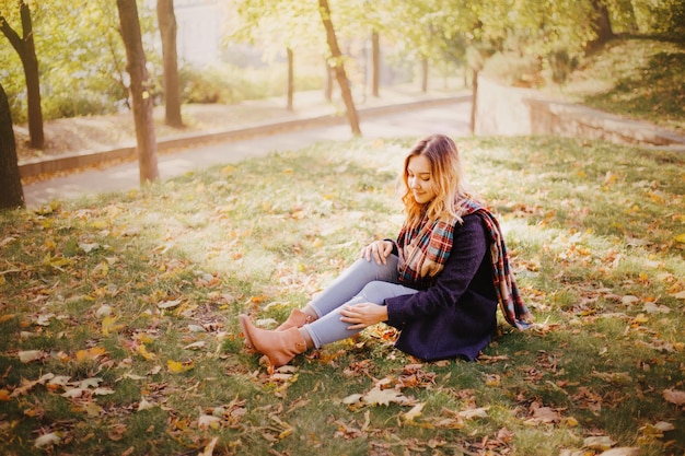 Beautiful young women in the autumn park