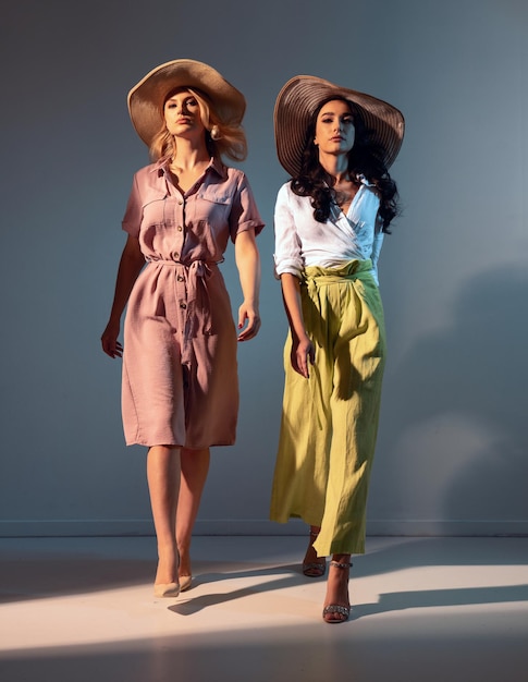 Beautiful young women , summer fashion concept