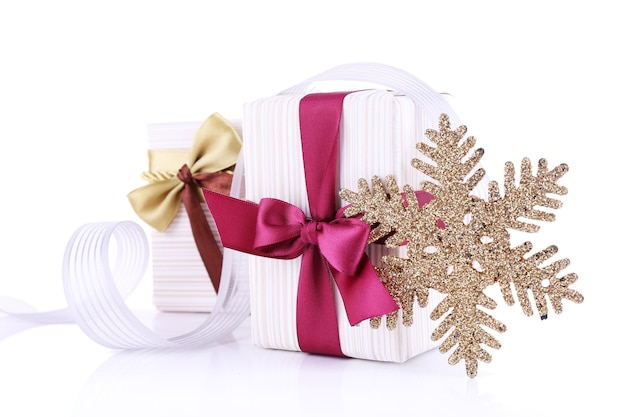 Photo beautifully packaged gifts isolated on white